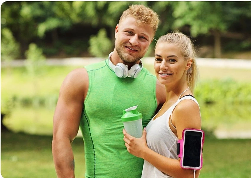 Fit couple, jogging in the park